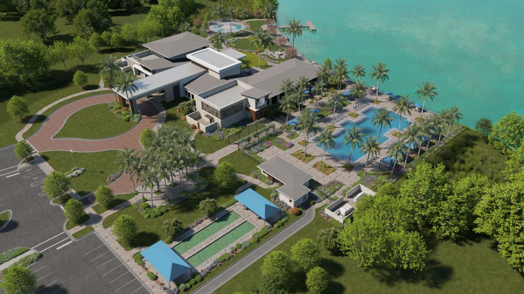 aerial view of amenity campus with community center pools restaurant and bocce ball court